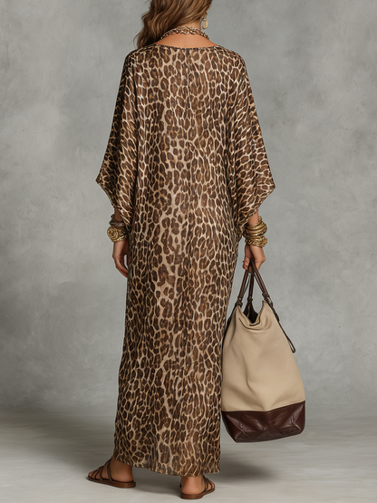 Vestido Largo de Leopardo con Nudo Frontal – Elegante y Sofisticado